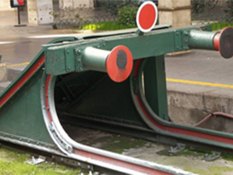 Rail mounted shock absorber